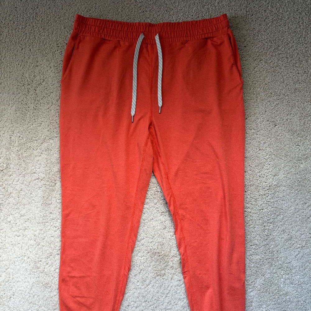 Vuori Performance Joggers Size Large - great condition.  Orange / Rust color